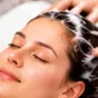 Guest relaxing during a head spa hair wash